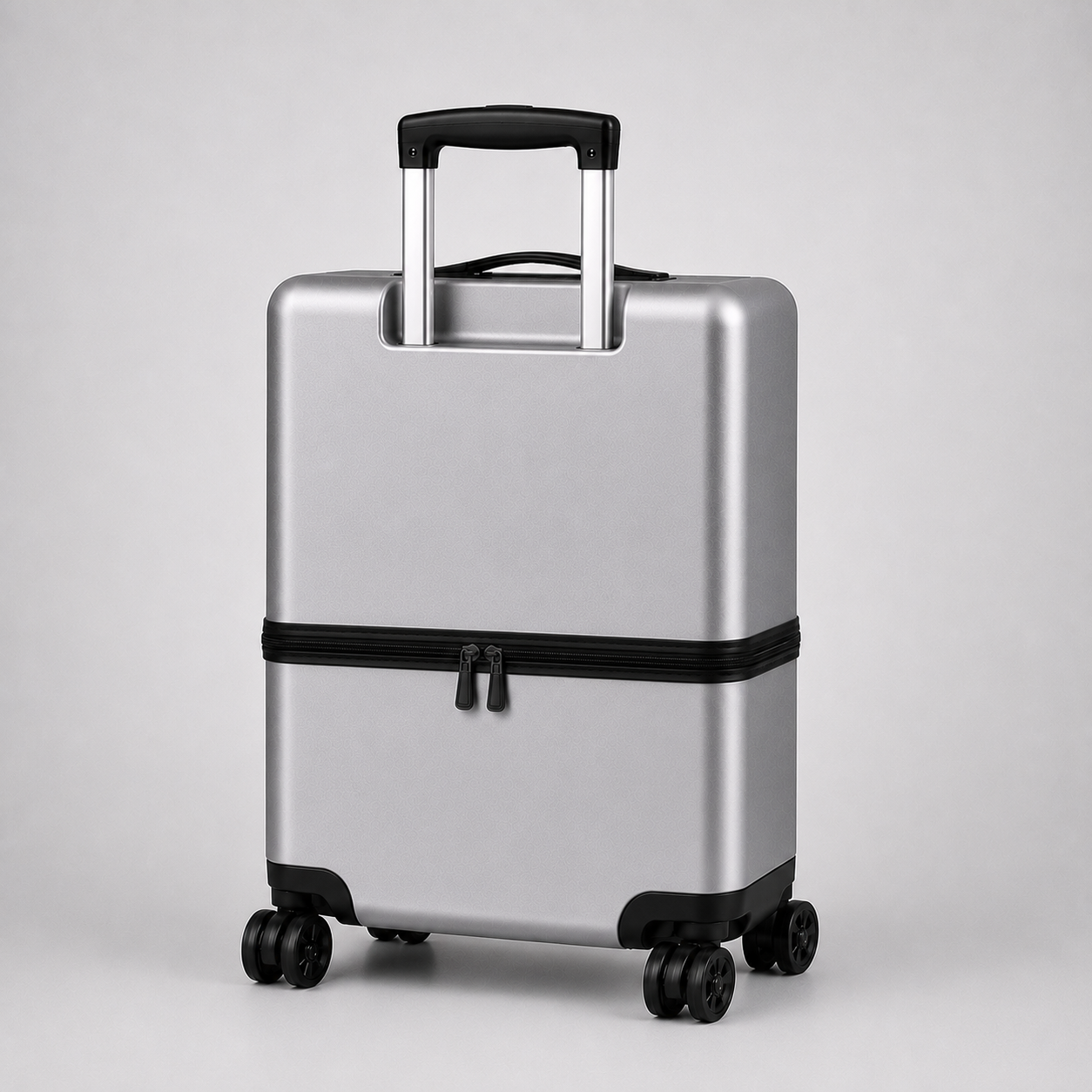 Uprijt patent-pending carry-on with transverse separation plane above the wheel zone